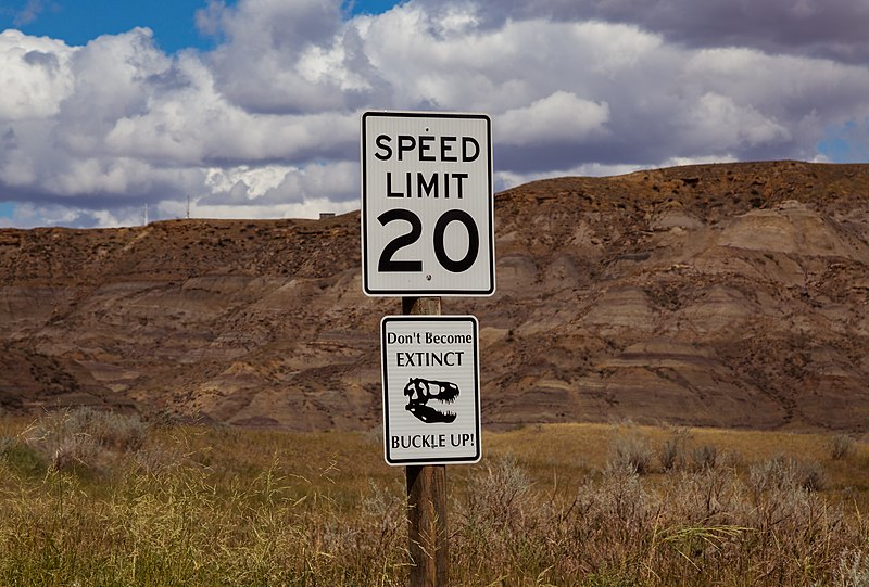 800px-don%27t become extinct - buckle up - speed limit 20 - makoshika state park %2832782681432%29