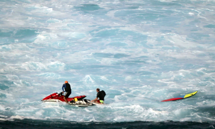 Jeff rowley big wave surfer flotation wetsuit jaws peahi maui by xvolution media - flickr - jeff rowley big wave surfer