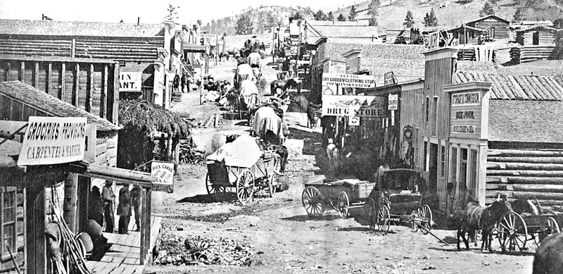 800px-1865 street scene - helena%2c montana territory %28probably s park ave looking east%29
