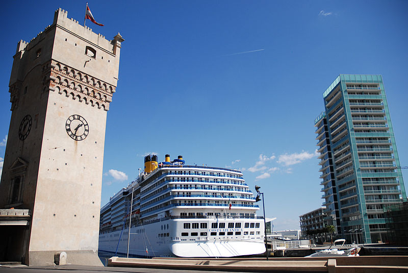 800px-the torretta clock tower in the port of savona against background of -costa atlantica- cruise ship. savona%2c liguria region%2c italy
