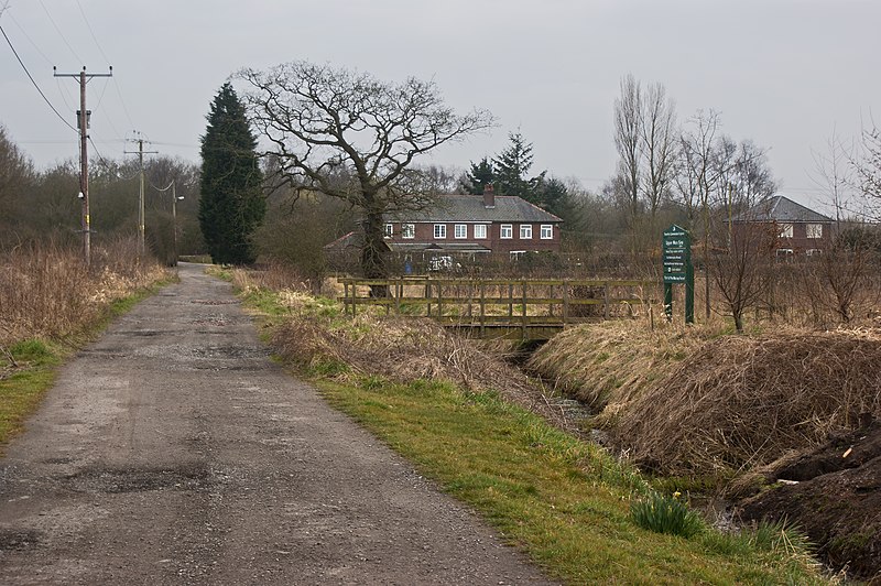 800px-the bridge gives access to land planted for the mersey forest at moss side - geograph.org.uk - 3410991