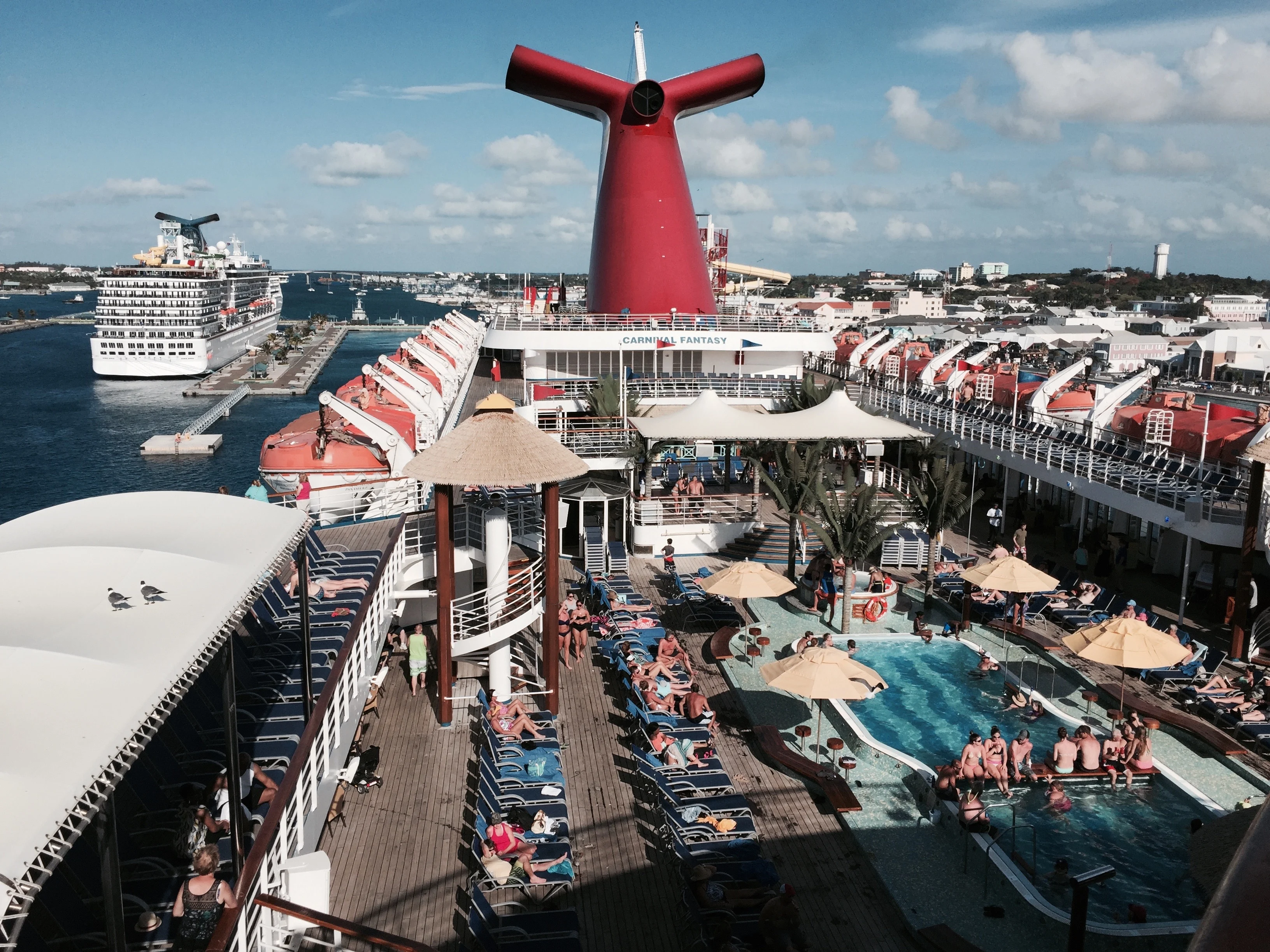 Wikimedia Commons (https://touristwire.com/wp-content/uploads/2023/05/Carnival_Fantasy_pool.jpg)