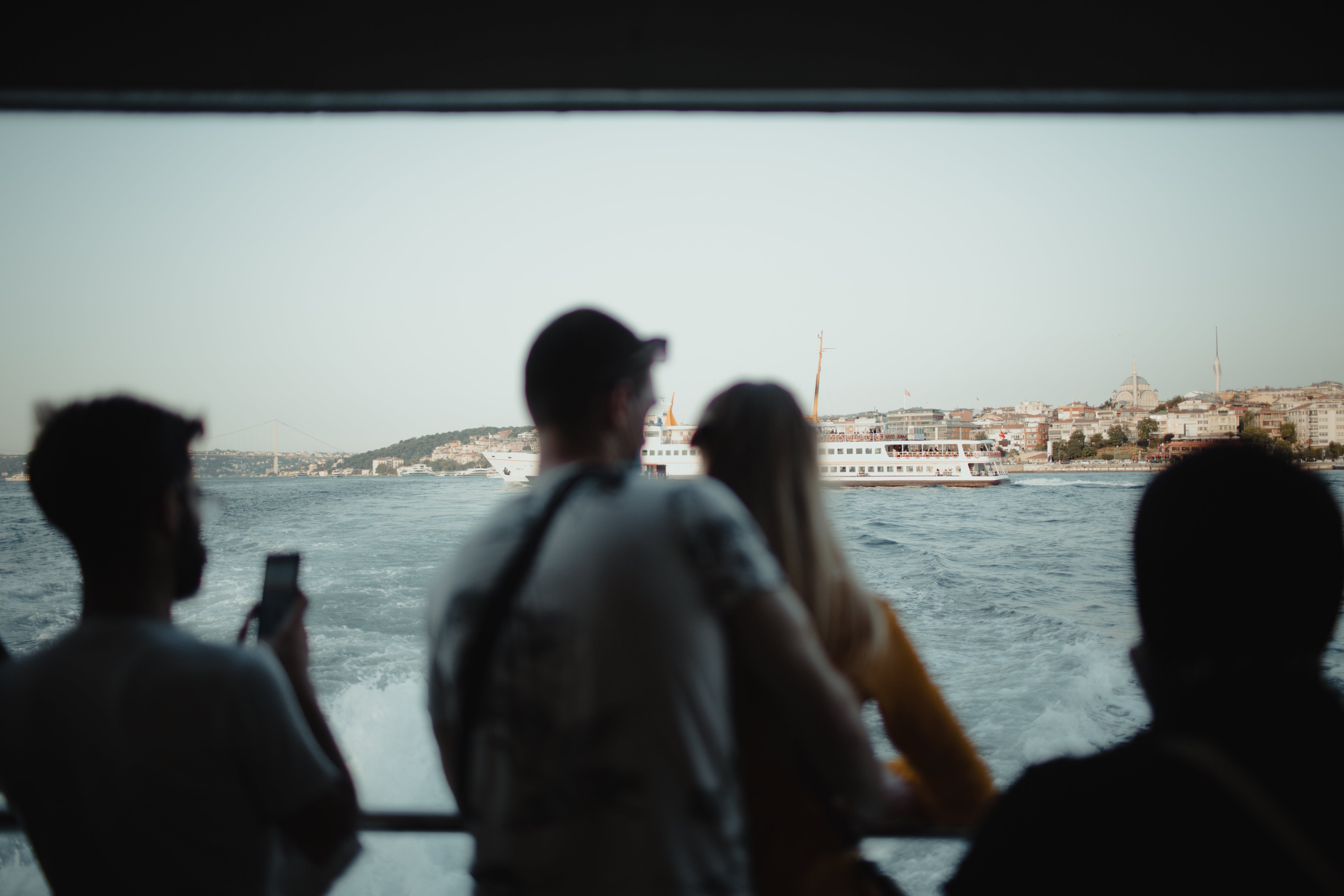 Free Passengers Watching Harbour from Cruise Ship Stock Photo