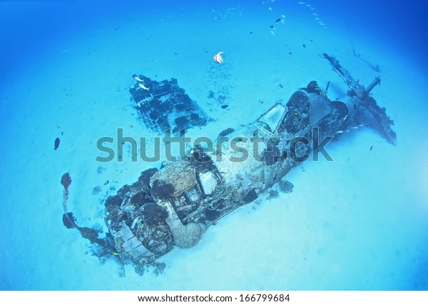 WW2 Corsair Wreck, Maunalua Bay. https://www.shutterstock.com/image-photo/ww2-era-corsair-airplane-wreck-located-166799684