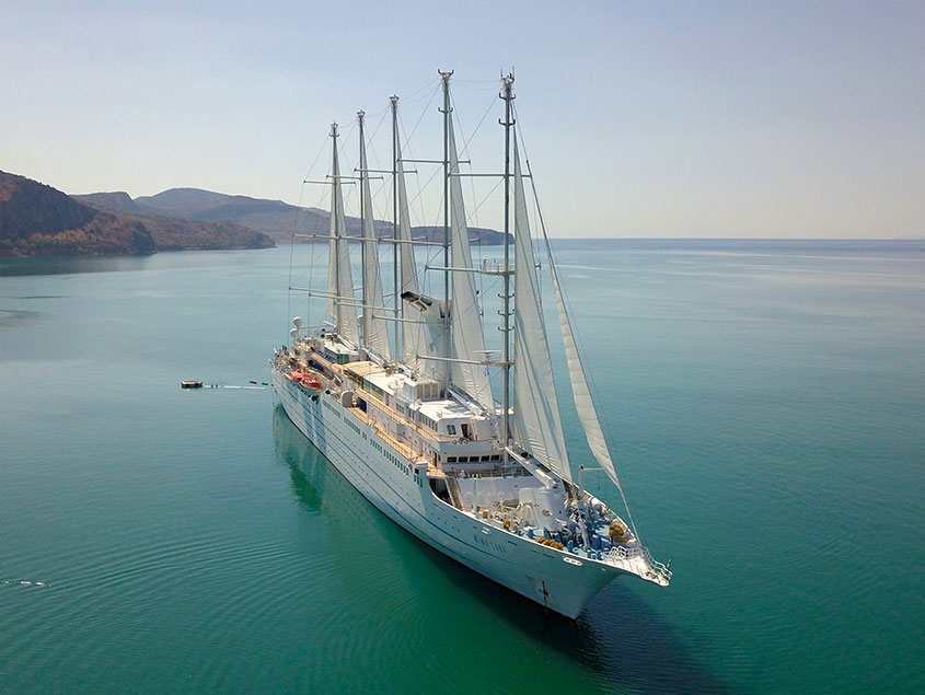 Image of Wind Surf, sourced from: Windstar Cruises https://touristwire.com/wp-content/uploads/2023/06/wind-surf-cruise-ship.jpgext.jpg