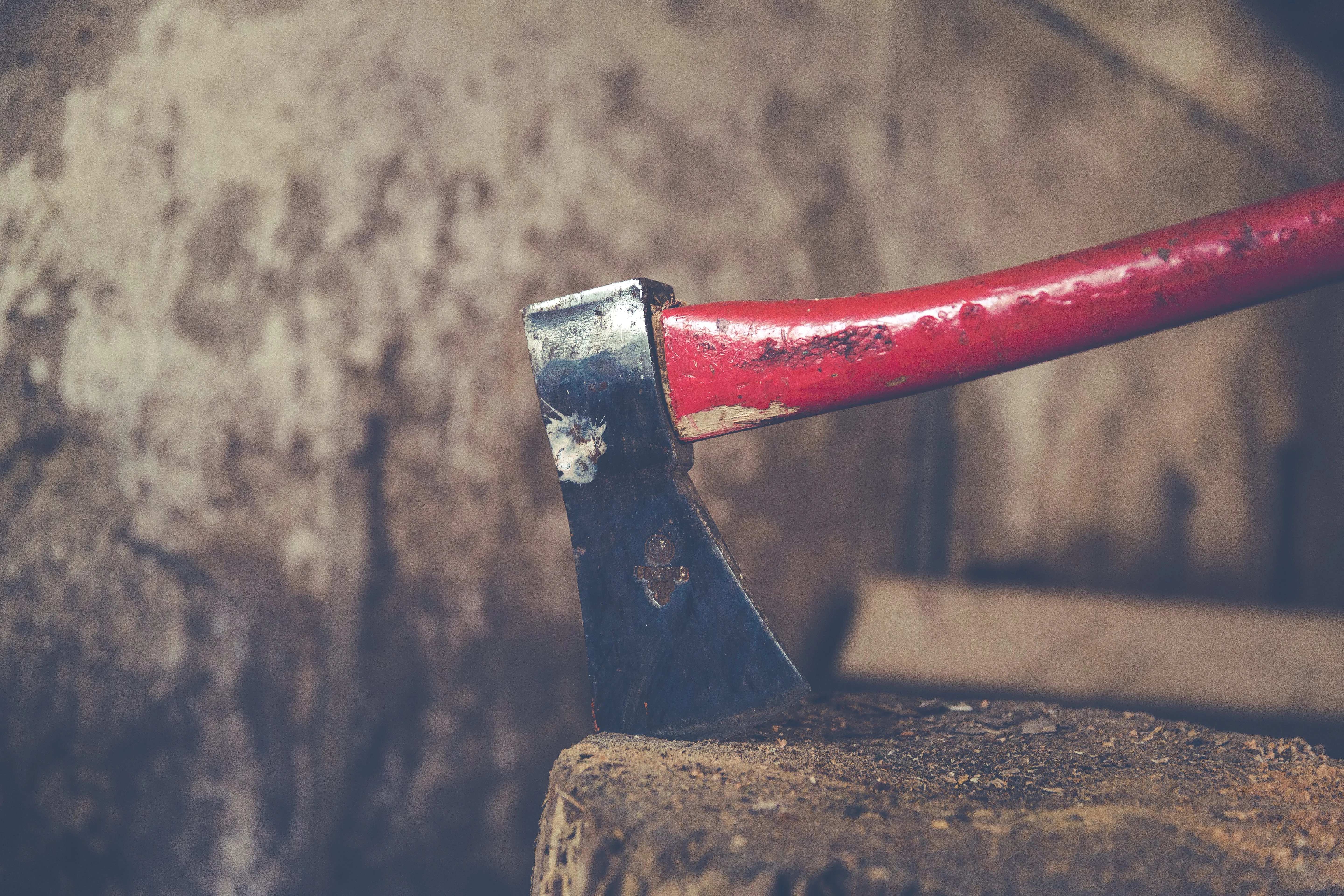 Axe-throwing. https://www.pexels.com/photo/red-and-black-metal-tool-203553/