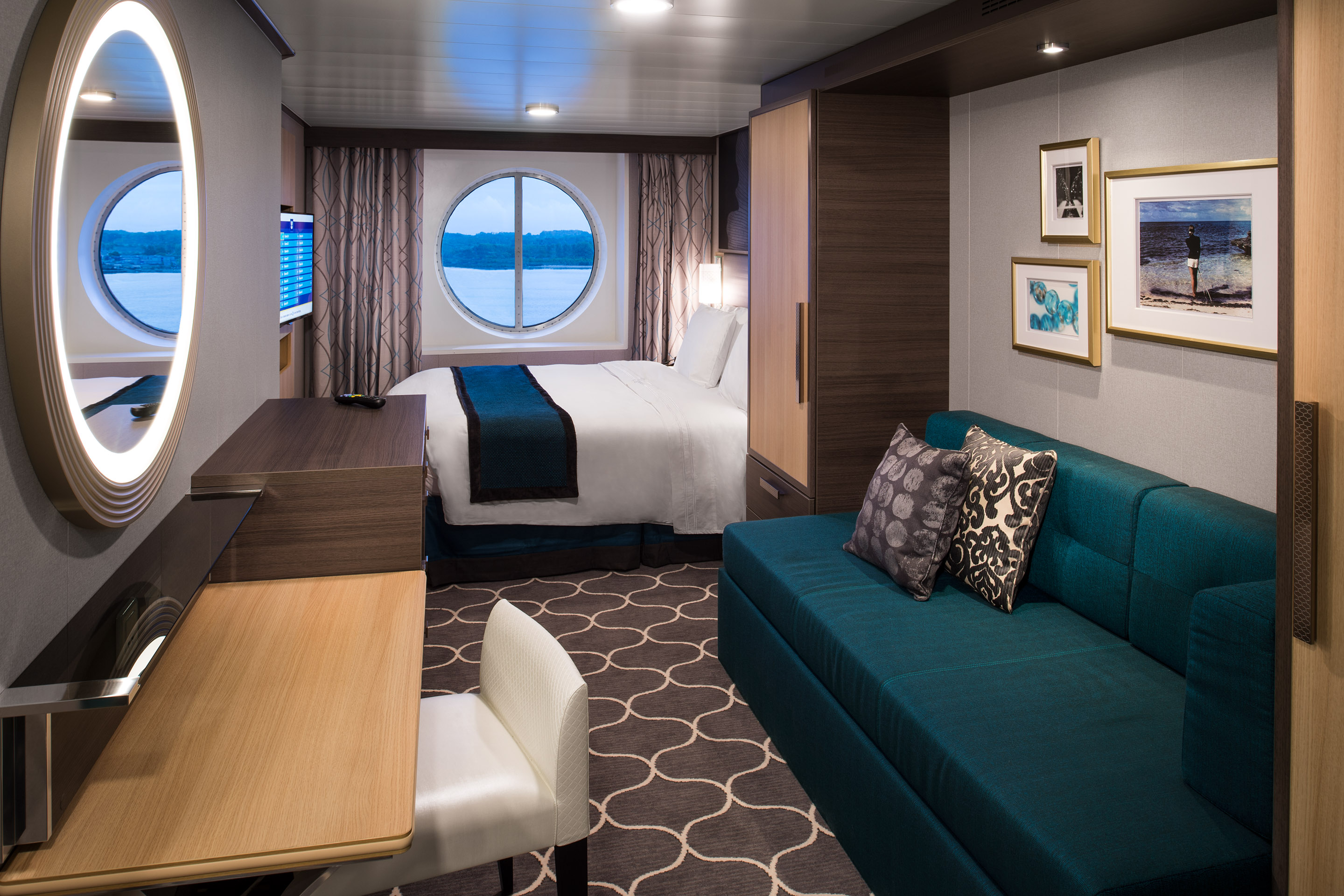 Image of Ocean View Cabin, sourced from: Royal Caribbean International https://touristwire.com/wp-content/uploads/2024/02/harmony-of-the-seas-oceanview-living-room.jpg