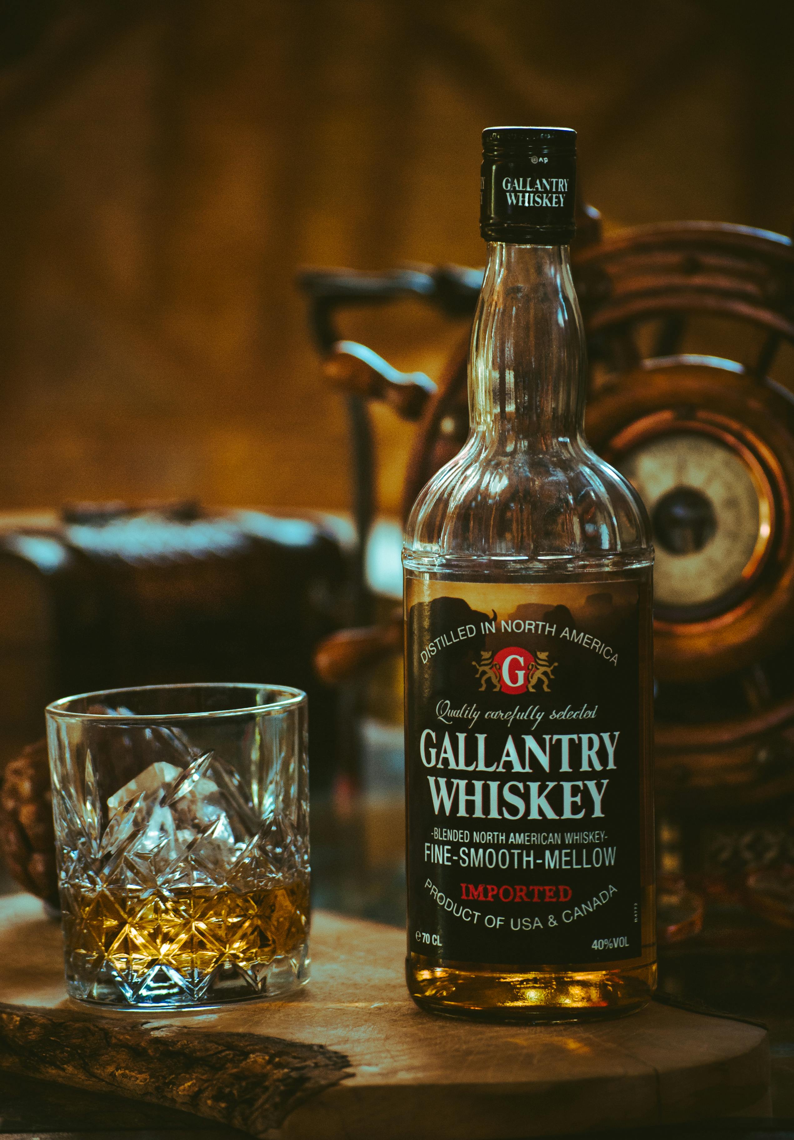 Free Gallantry Whiskey Bottle Beside Glass  Stock Photo