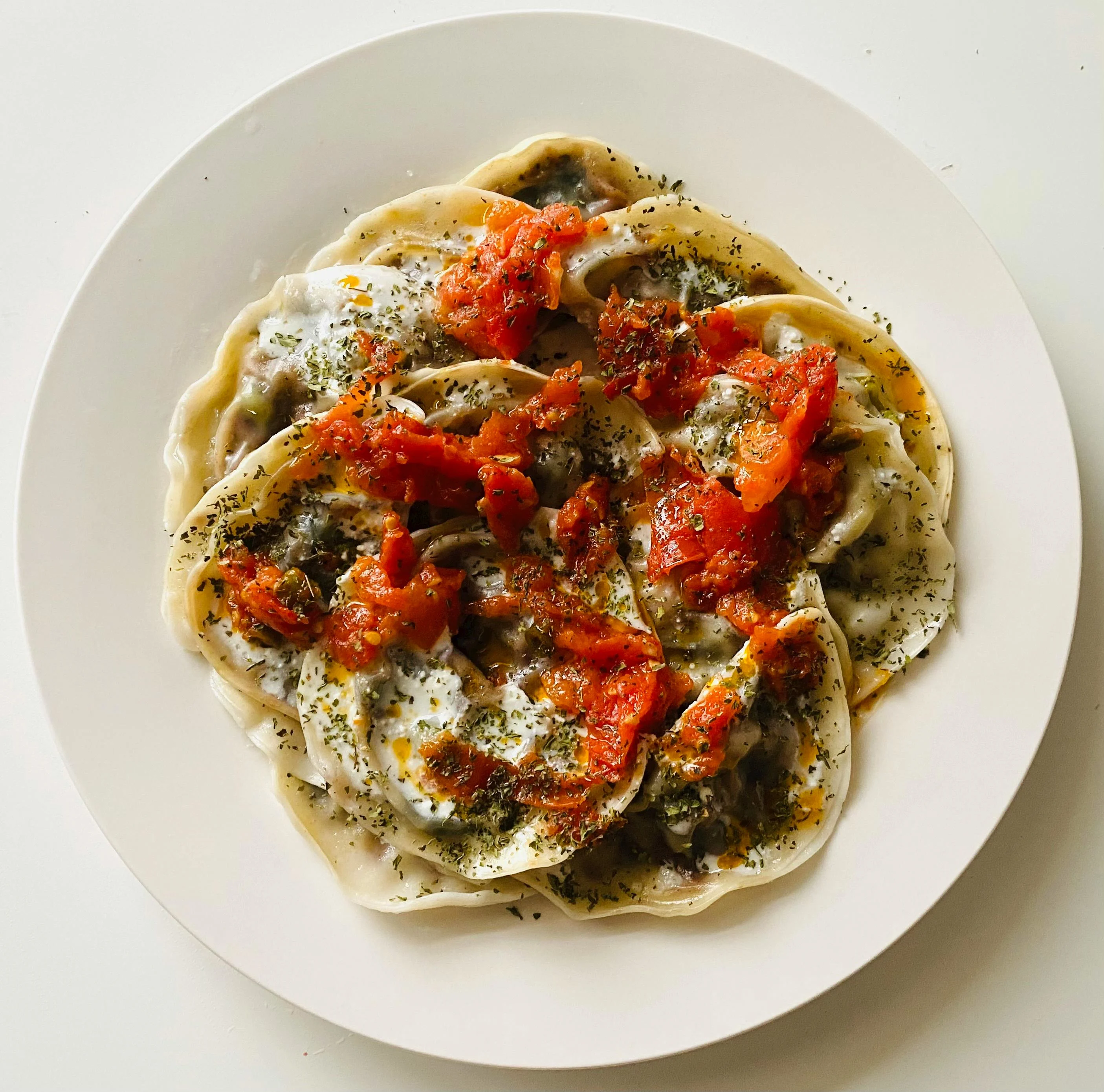 Free Top View of Delicious Ravioli on White Plate Stock Photo