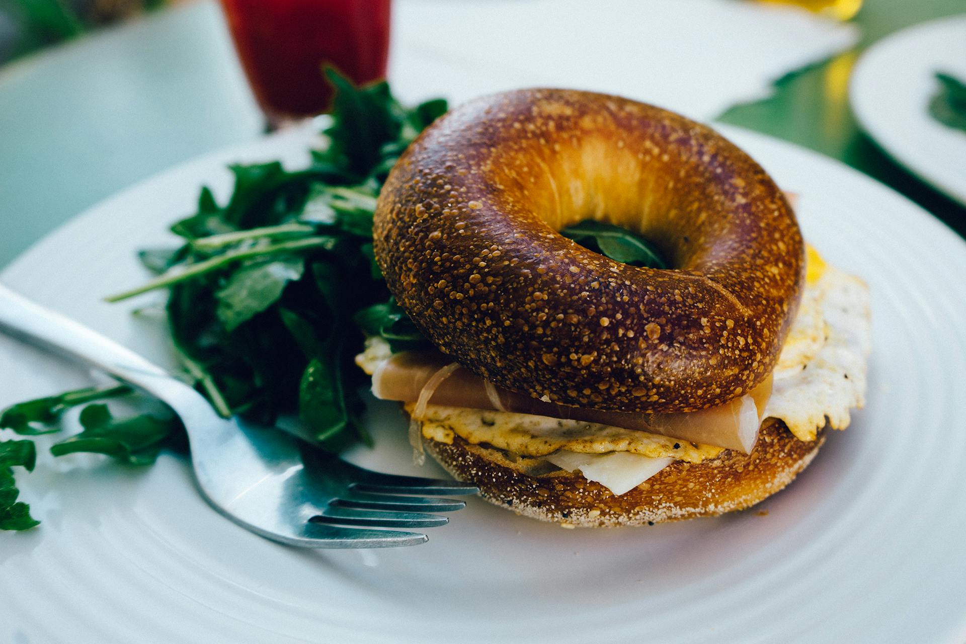 Pexels (https://touristwire.com/wp-content/uploads/2024/04/food-breakfast-fork-bagel.jpg)