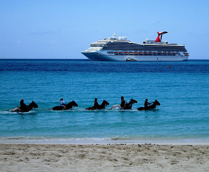 File:Tourists on horseback in water, Half Moon Beach, Half Moon Cay with MS Carnival Valor.jpg